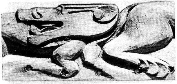 Кабан — деталь резьбы на деревянной основе колчана из женского погребения.